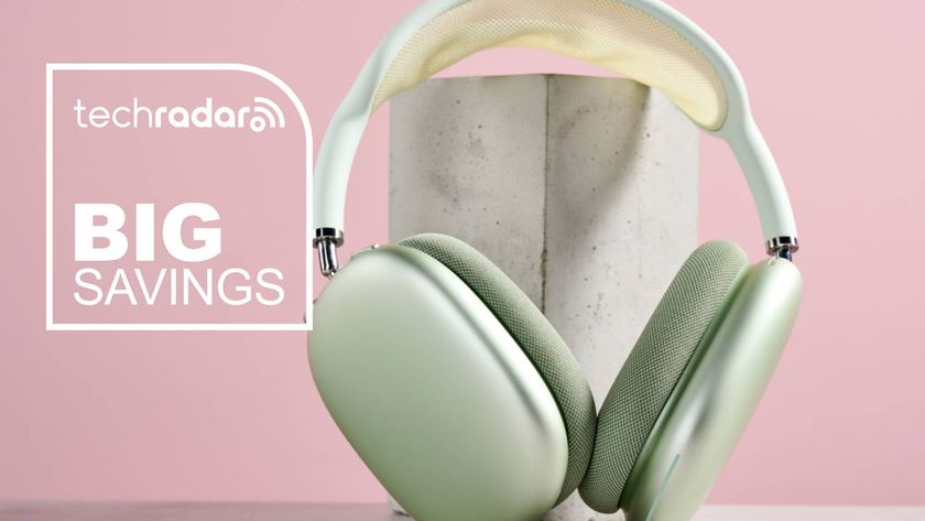 Apple AirPods Max on pink background with the words 'TechRadar: big savings'