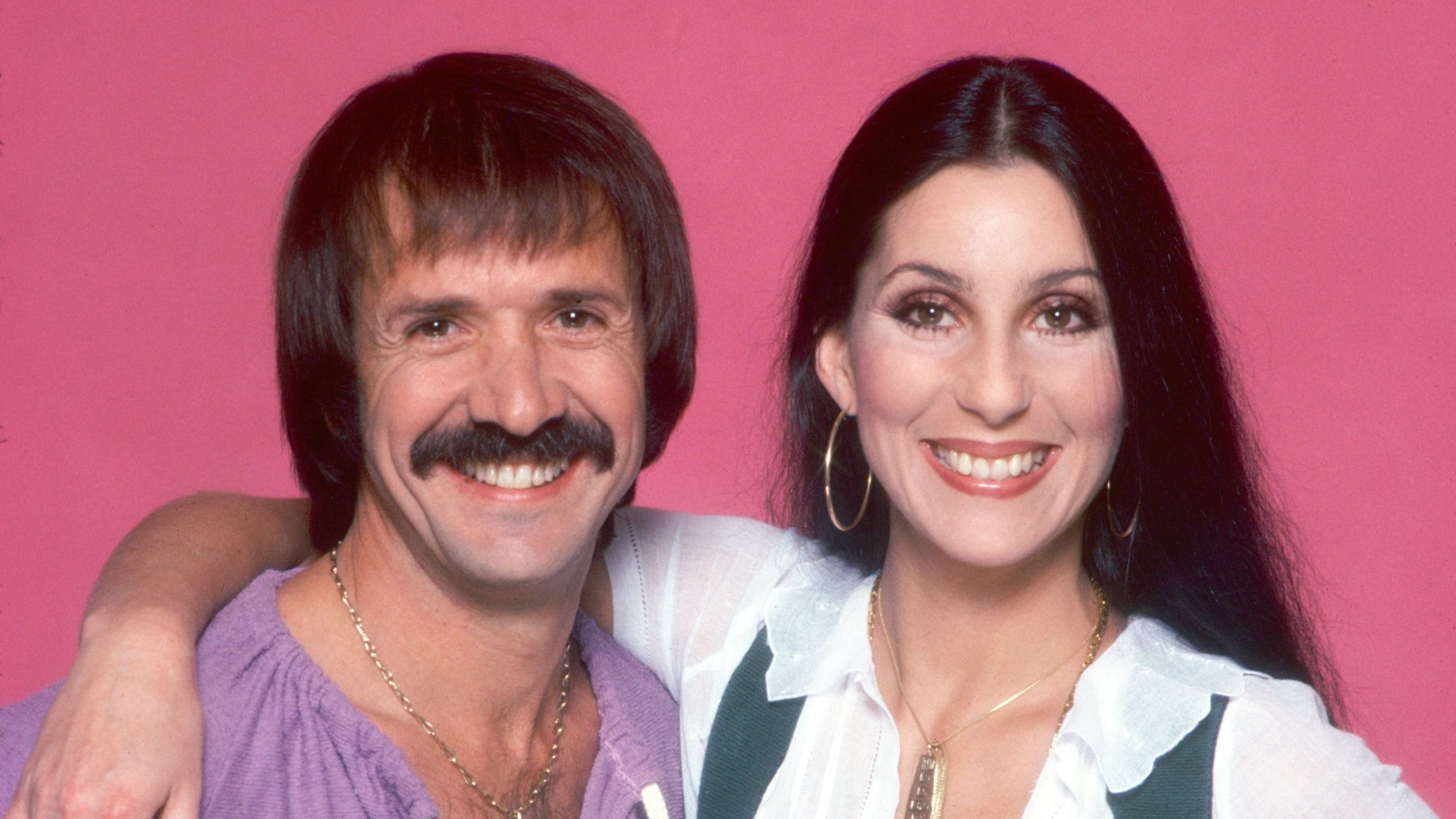 sonny and cher on a pink background