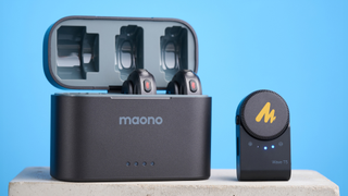 the maono wave t5 in the charging case showing the receiver and transmitters