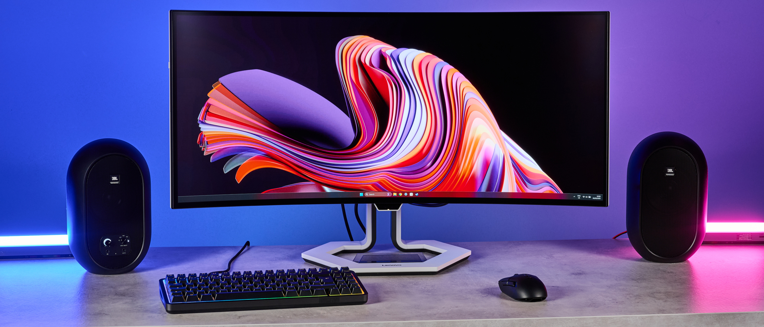 The Lenovo Legion Pro 34WD-10 gaming monitor as part of a gaming setup