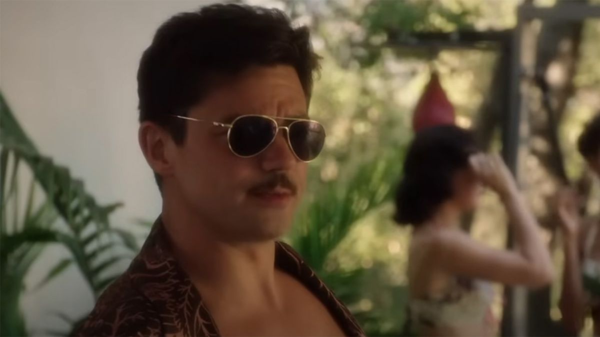 Dominic Cooper as Howard Stark by the pool.