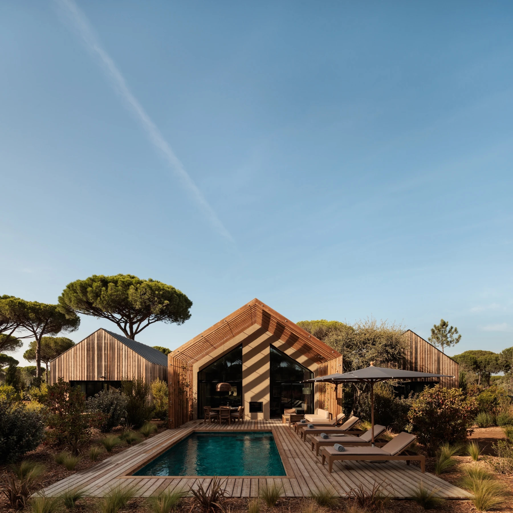 Wooden cabin-style hotel room with a swimming pool