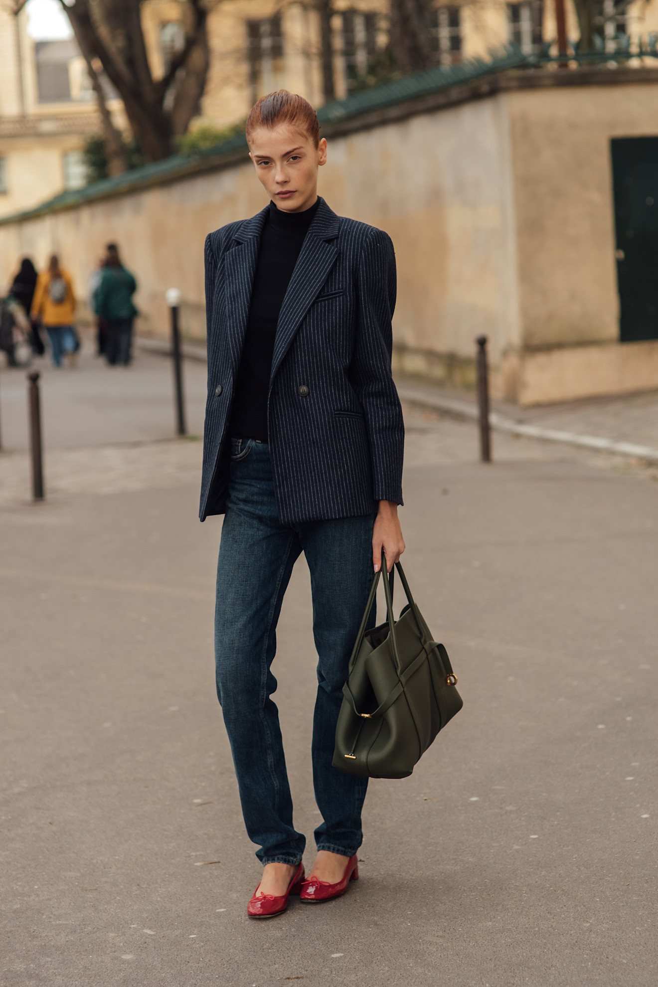 woman wearing jeans.and a blazer