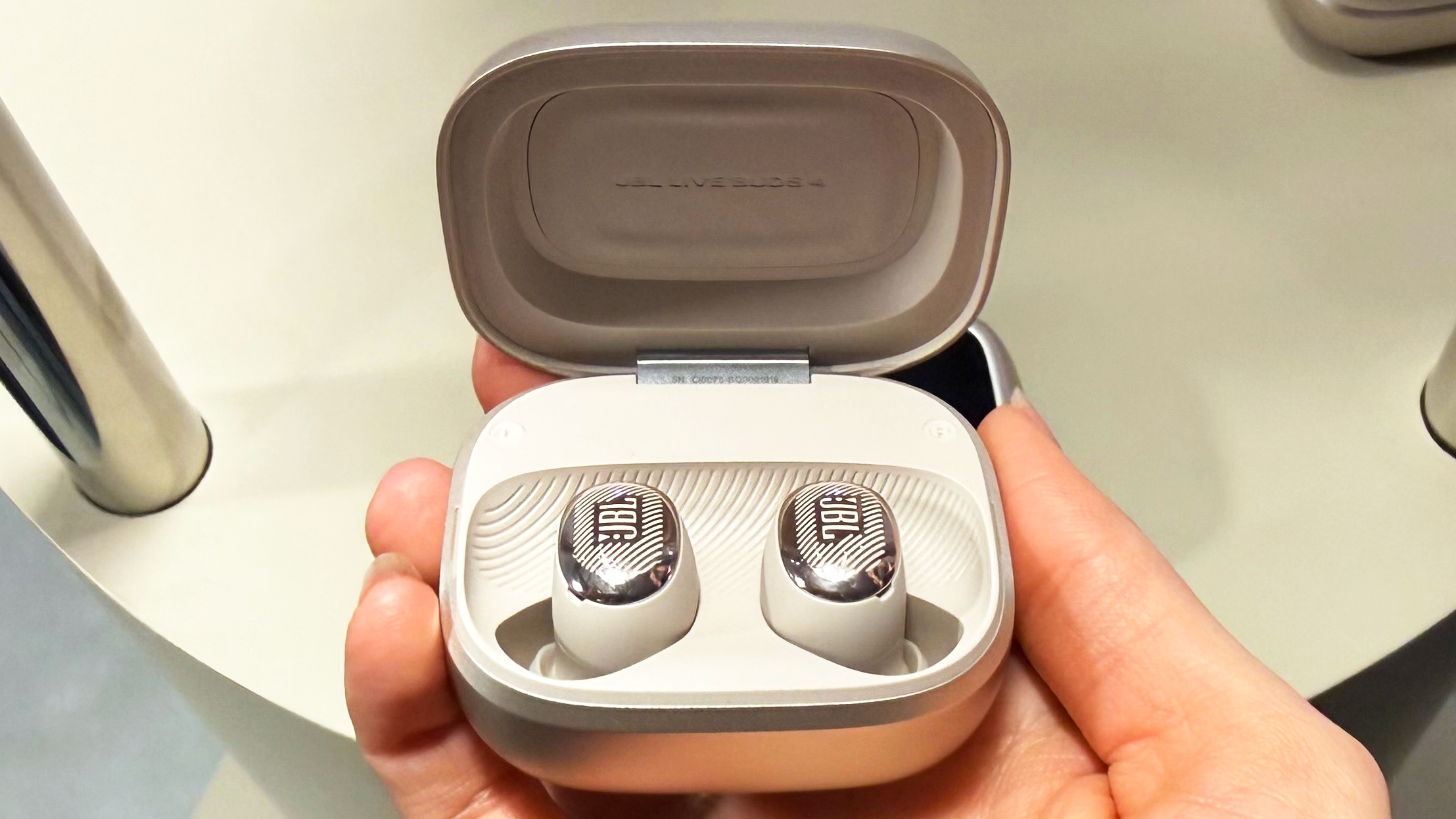 the jbl live buds 4 in beige