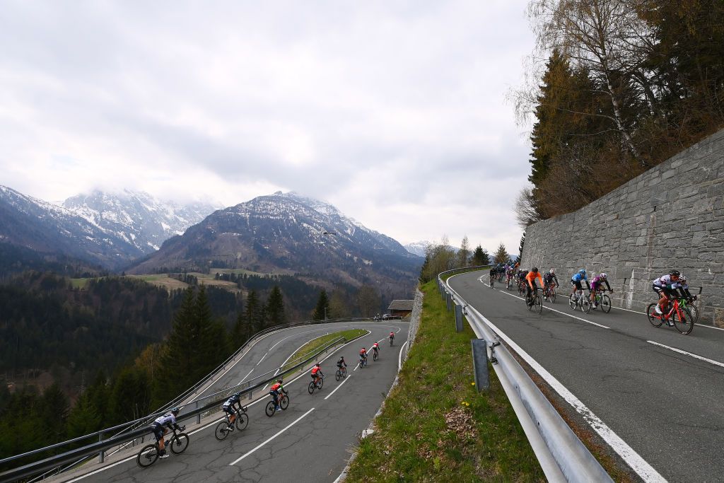 LIENZ AUSTRIA APRIL 21 A general view of Thymen Arensman of Netherlands and Team DSM white best young jersey and the peloton passing through Kartitscher Sattel 1524m mountain landscape during the 45th Tour of the Alps 2022 Stage 4 a 1424km stage from Villabassa to Kals am Grossglockner 1336m TouroftheAlps on April 21 2022 in Lienz Austria Photo by Tim de WaeleGetty Images