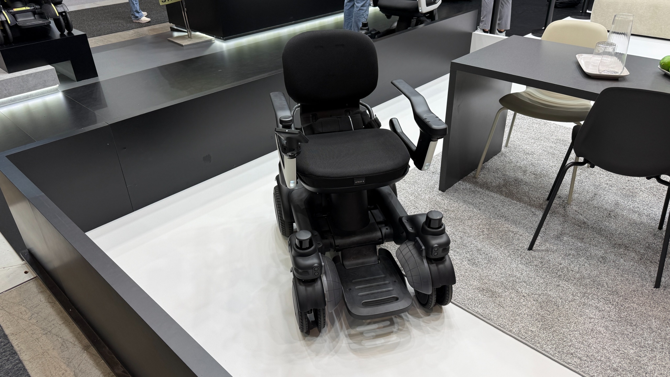 The Strutt ev1c mobility vehicle shown without a rider, from the front