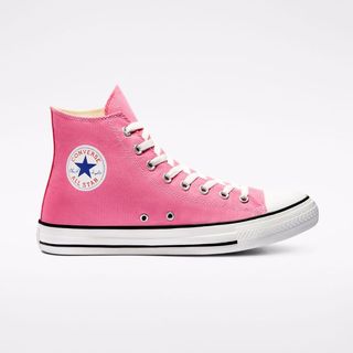 Pink high top Converse trainers
