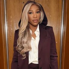 Serena Williams styled a burgundy hooded blazer with matching mini shorts