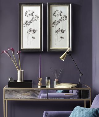 room with photoframe on purple wall