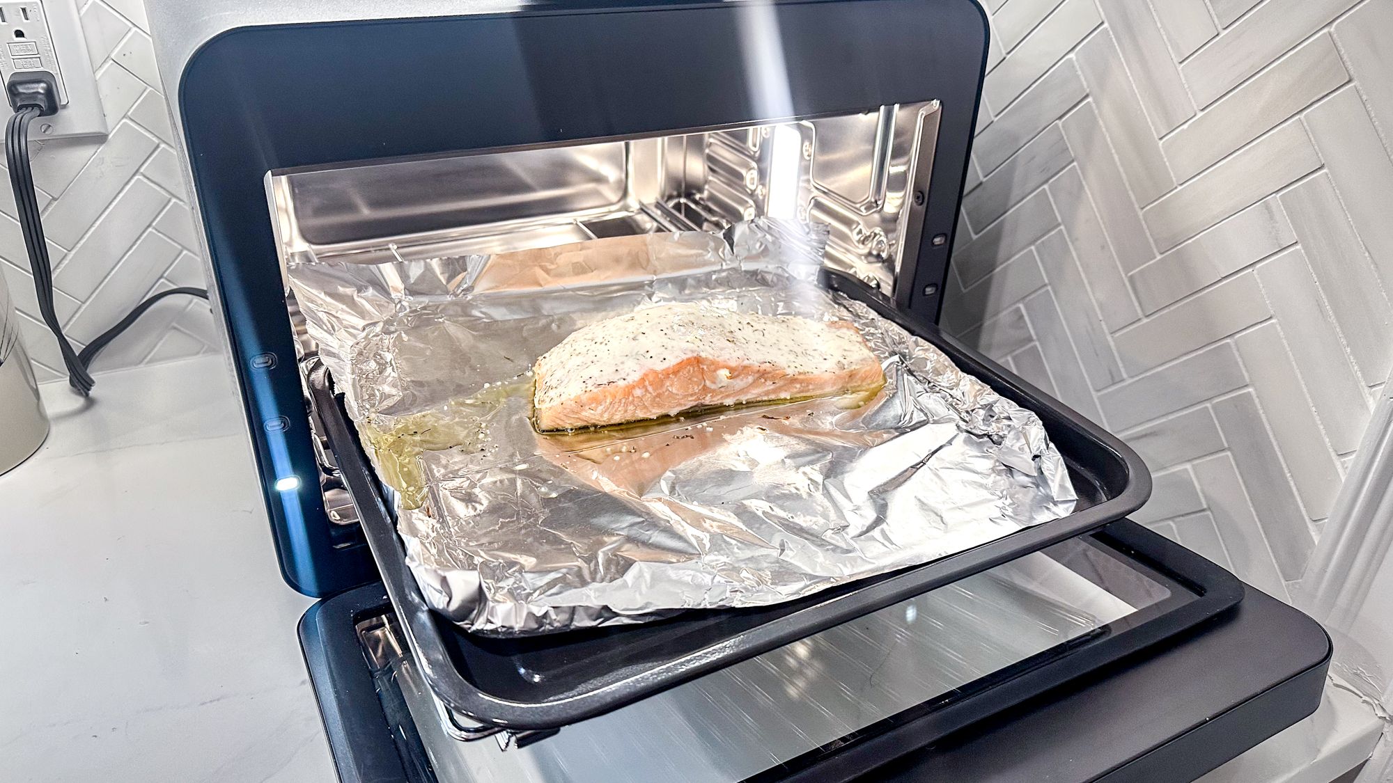 CHEF iQ MiniOven on a kitchen counter