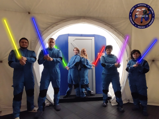 The Selene III crew pose as Jedi knights to cheer themselves up during their stressful confinement in the HI-SEAS habitat.