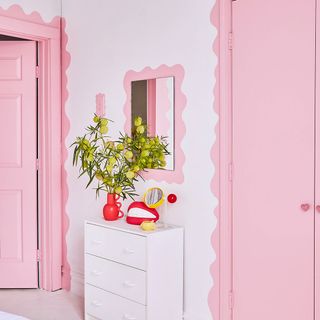 Hallway in Collé's pink home