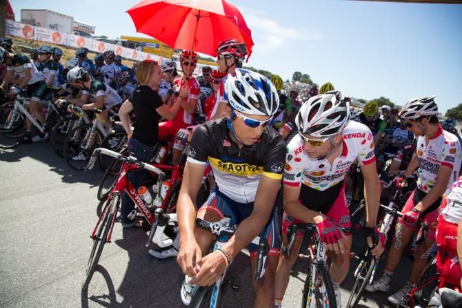 Cole House, overall race leader following stage one, chats with Ricardo Van Der Velde before the start of stage two.