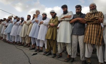 Members of the suspected terrorist organization Jamaat-ud-Dawa weep during a funeral prayer for Osama bin Laden: Some say al Qaeda has merely suffered a temporary setback with the death of it