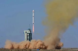 A Chinese Long March 4B rocket carrying the Fengyun 3G weather satellite rises from the pad at Jiuquan spaceport on April 15, 2023 (April 16 GMT and local time). 