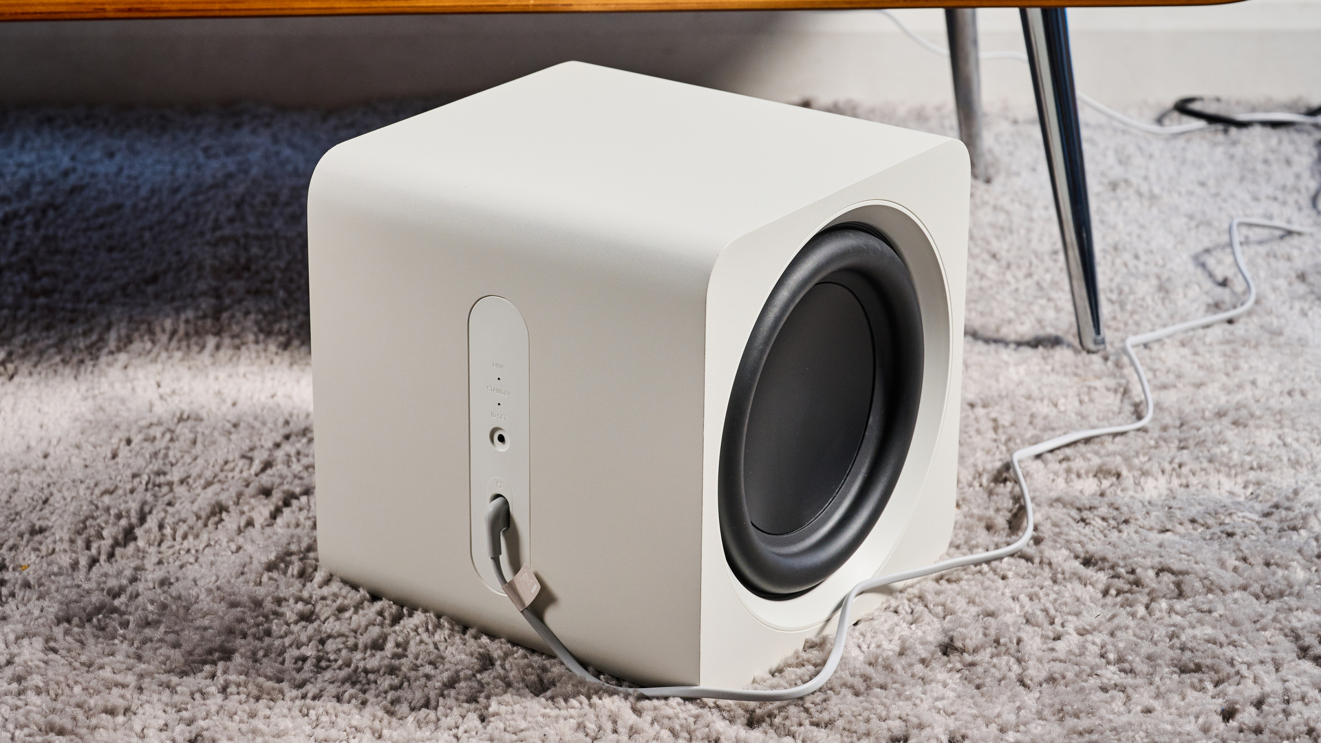 the samsung hw-s801d soundbar and subwoofer in white, an ultra slim soundbar with on-bar buttons, a remote, and separate subwoofer with a black cone
