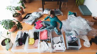 person sorting clothes