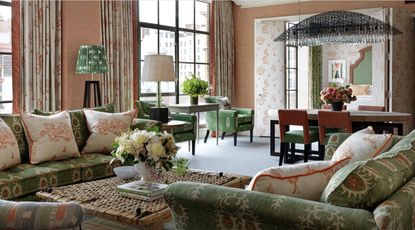 Crosby Street Hotel living room with orange and green color combination decor