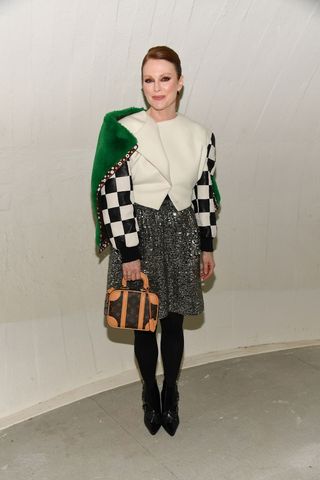 Julienne Moore carrying a Louis Vuitton bag