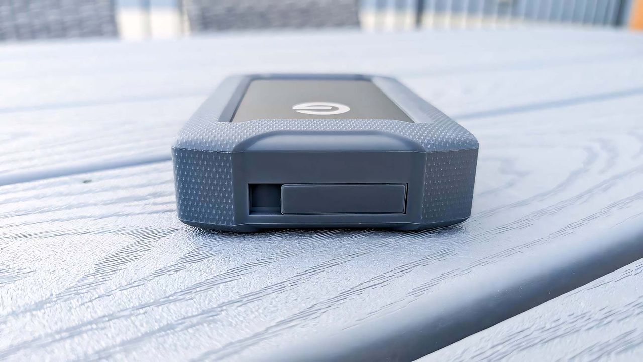 SanDisk Professional G-DRIVE ArmorATD rubber USB-C port cover closed.