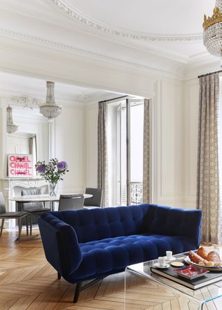 An historic Parisian apartment holds a statement modern sofa