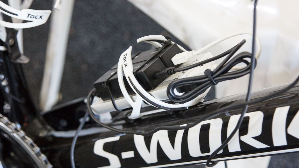 The mechanic at Ettix-Quick Step had this clever approach to Shimano Di2 battery charging. It's a USB laptop/mobile charging battery with Di2 chargers zip tied in place