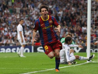 Lionel Messi peels away in celebration after scoring his superb solo goal for Barcelona against Real Madrid in the 2011 Champions League semi-final first leg in 2011.
