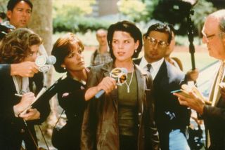 Neve Campbell (as Sidney Prescott), speaking to reporters, in the movie Scream 2