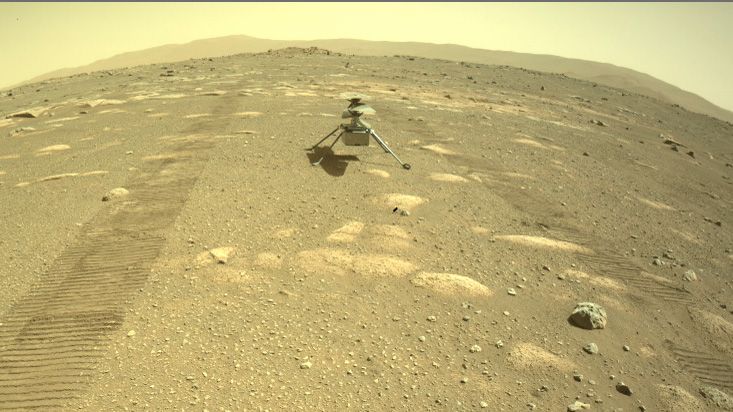 NASA's Mars Helicopter Ingenuity is seen on the surface of the Red Planet after being deployed by the Perseverance rover on April 4, 2021.