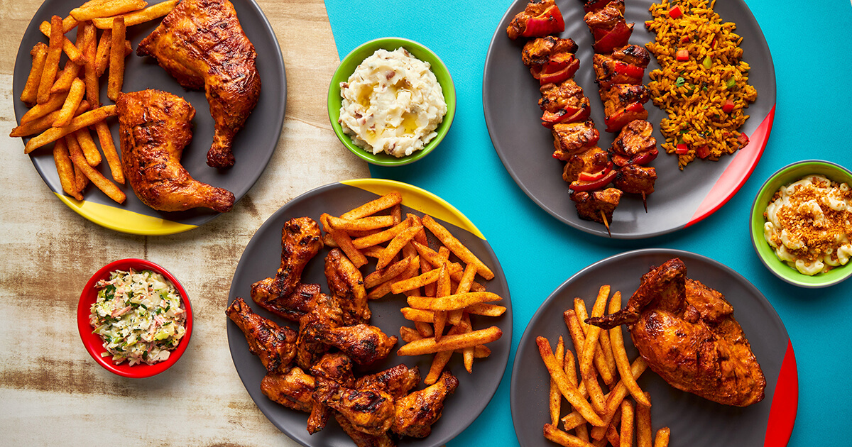 A table filled with Nando's food