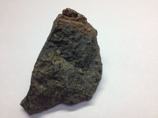 A piece of lava from Mangaia island contains tiny 2.5-billion-year-old sulfide grains, carried up from the mantle by a hotspot plume.