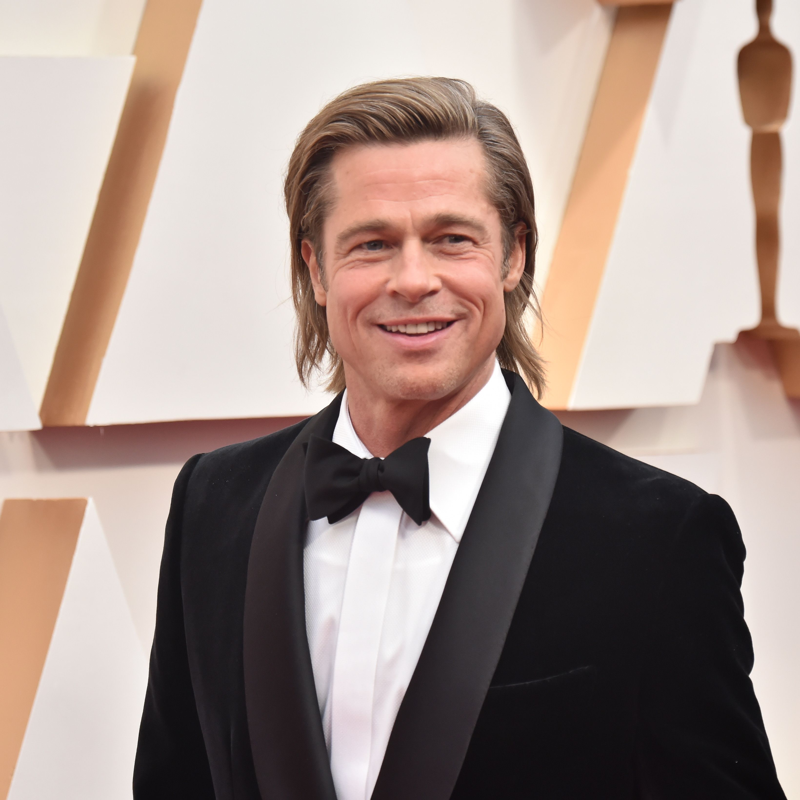 Brad Pitt Steps Out in France With German Model Nicole Poturalski