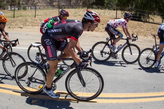 Ben Jacques-Maynes (Jamis-Hagens Berman) brings water bottles to the front for the leader.