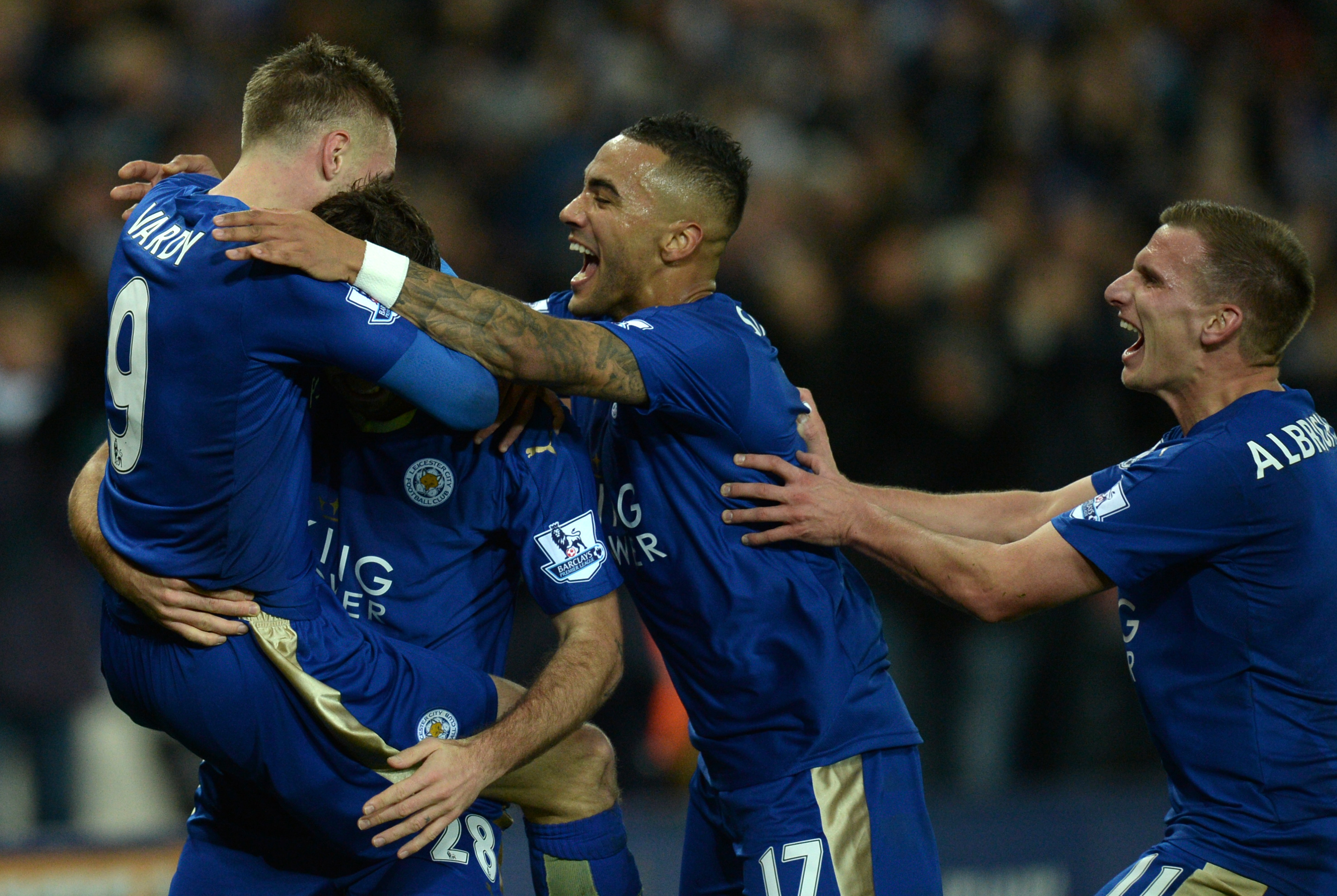 Leicester City&amp;amp;apos;s English striker Jamie Vardy (L) celebrates after scoring with Leicester City&amp;amp;apos;s Austrian defender Christian Fuchs (2L), Leicester City&amp;amp;apos;s English defender Danny Simpson and Leicester City&amp;amp;apos;s English midfielder Marc Albrighton during the English Premier League football match between Leicester City and Manchester United at the King Power Stadium in Leicester, central England on November 28, 2015. AFP PHOTO / OLI SCARFFRESTRICTED TO EDITORIAL USE. No use with unauthorized audio, video, data, fixture lists, club/league logos or &amp;amp;apos;live&amp;amp;apos; services. Online in-match use limited to 75 images, no video emulation. No use in betting, games or single club/league/player publications. / AFP / OLI SCARFF (Photo credit should read OLI SCARFF/AFP via Getty Images)