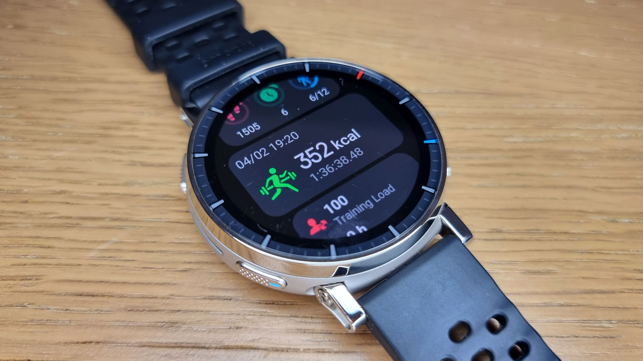 a close-up picture of the Amazfit Active 3 Premium displaying our reviewer's daily health stats