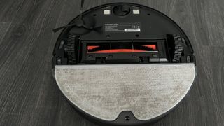 The underneath of the Dreame Bot L10 Pro with the mopping pad attached