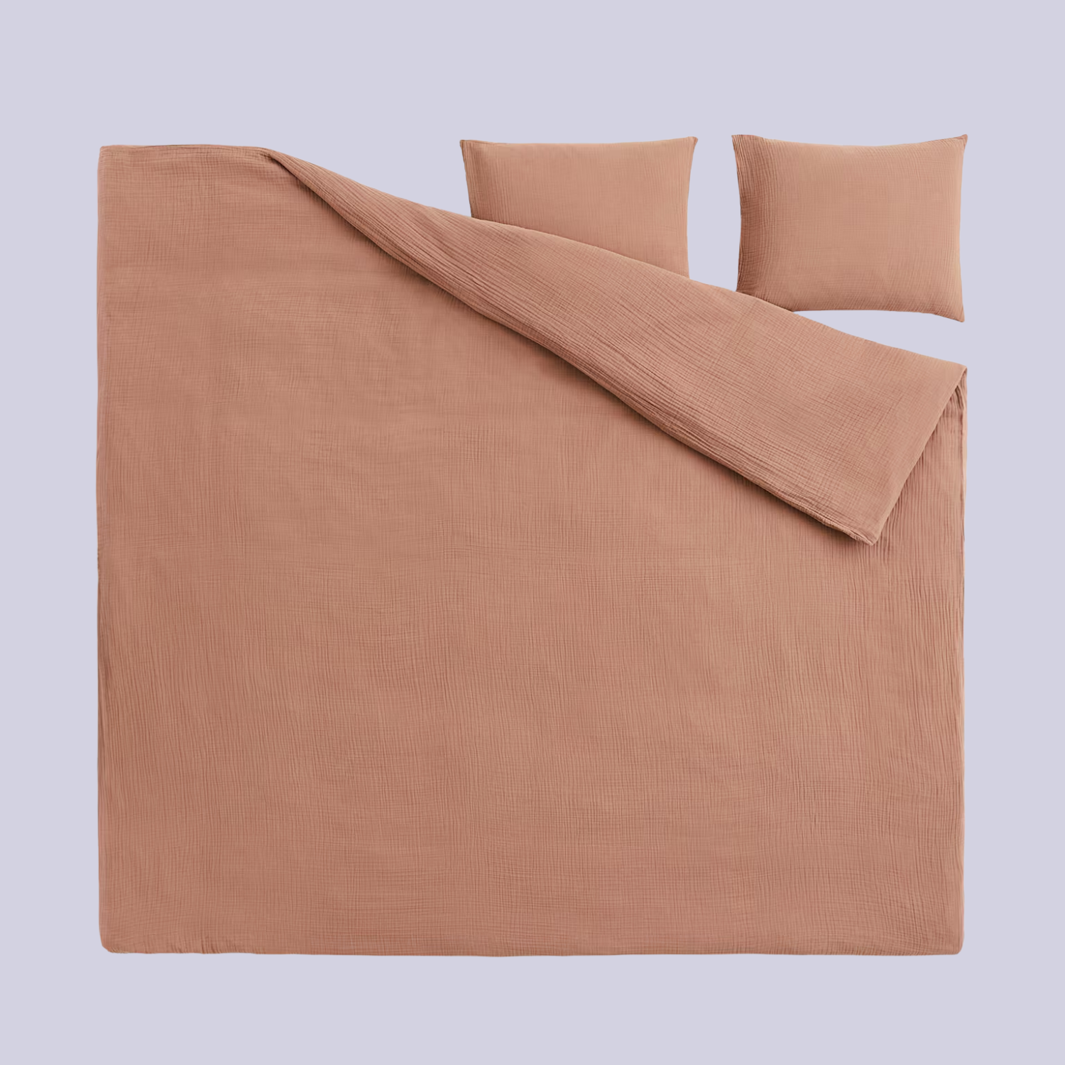 A dusty pink muslin duvet set