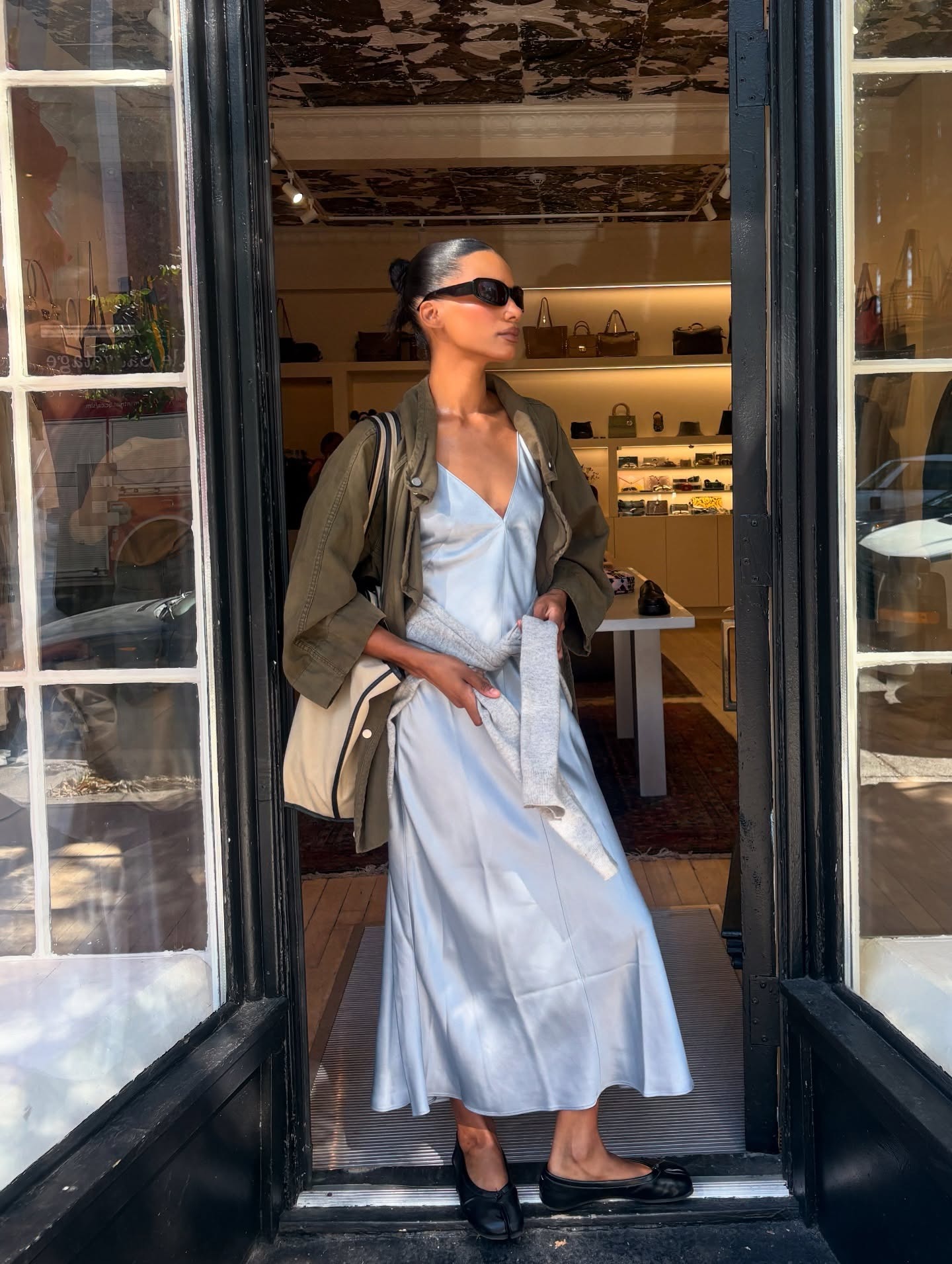 Audrey wearing blue slip dress