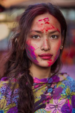  KATHMANDU, NEPAL. Sona is celebrating Holi, the Hindu festival of colors, and among the most spectacular gatherings I witnessed in my travels. A time to forgive and to be forgiven, Holi marks the coming of spring, when good triumphs over evil.