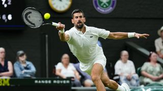 Novak Djokovic plays a forehand at Wimbledon 2025