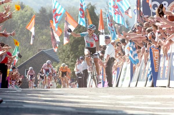 The happiest man in Belgium, Philippe Gilbert, soaks up the crowds' applause at the finish.