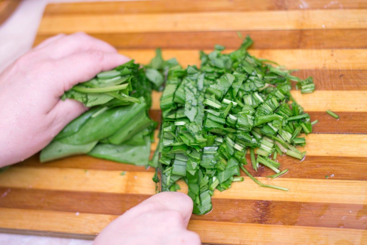 Chopping Of Sorrel Plants On A Cutting Board