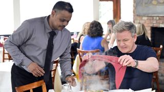 Gordon Ramsay speaks with staff at Diwan on Kitchen Nightmares season 8