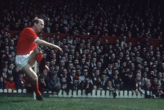 Bobby Charlton taking a corner for Manchester United in 1968.