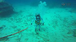 An unidentified crew member participates in a NASA Extreme Environment Mission Operations (NEEMO) mission.