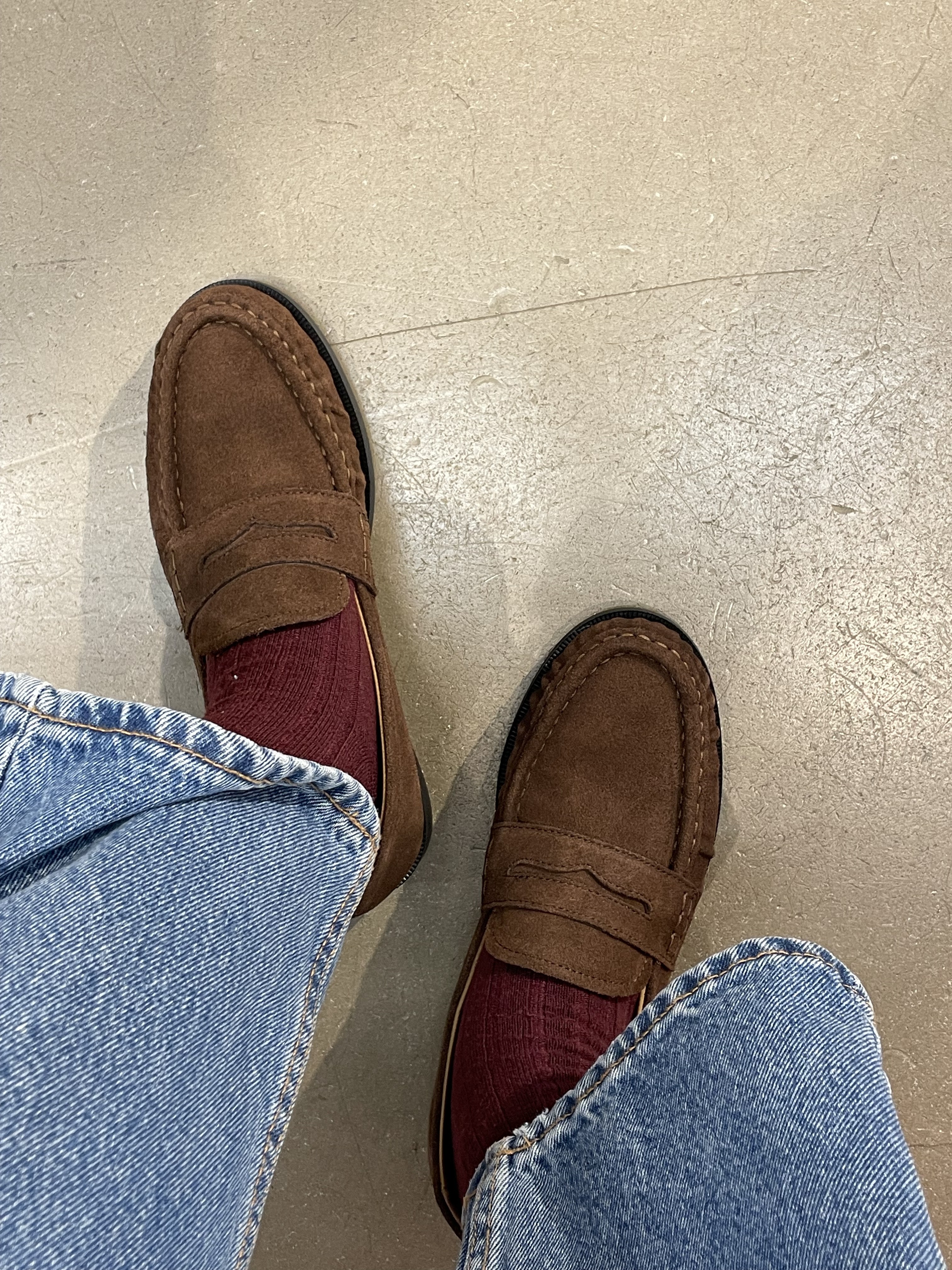 Image of brown suede loafers