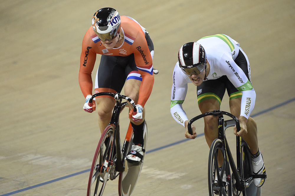 Australia's Matthew Glaetzer (L) and the Netherlands' Jeffrey Hoogland compete in the second race of the Men's Sprint Quarterfinals at the 2015 UCI Track Cycling World Championships