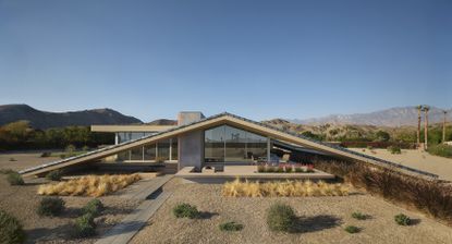 Desert house by Robert Stone, a home made with perforated partitions and an intense pitched low roof, one of our 15 top houses of 2025