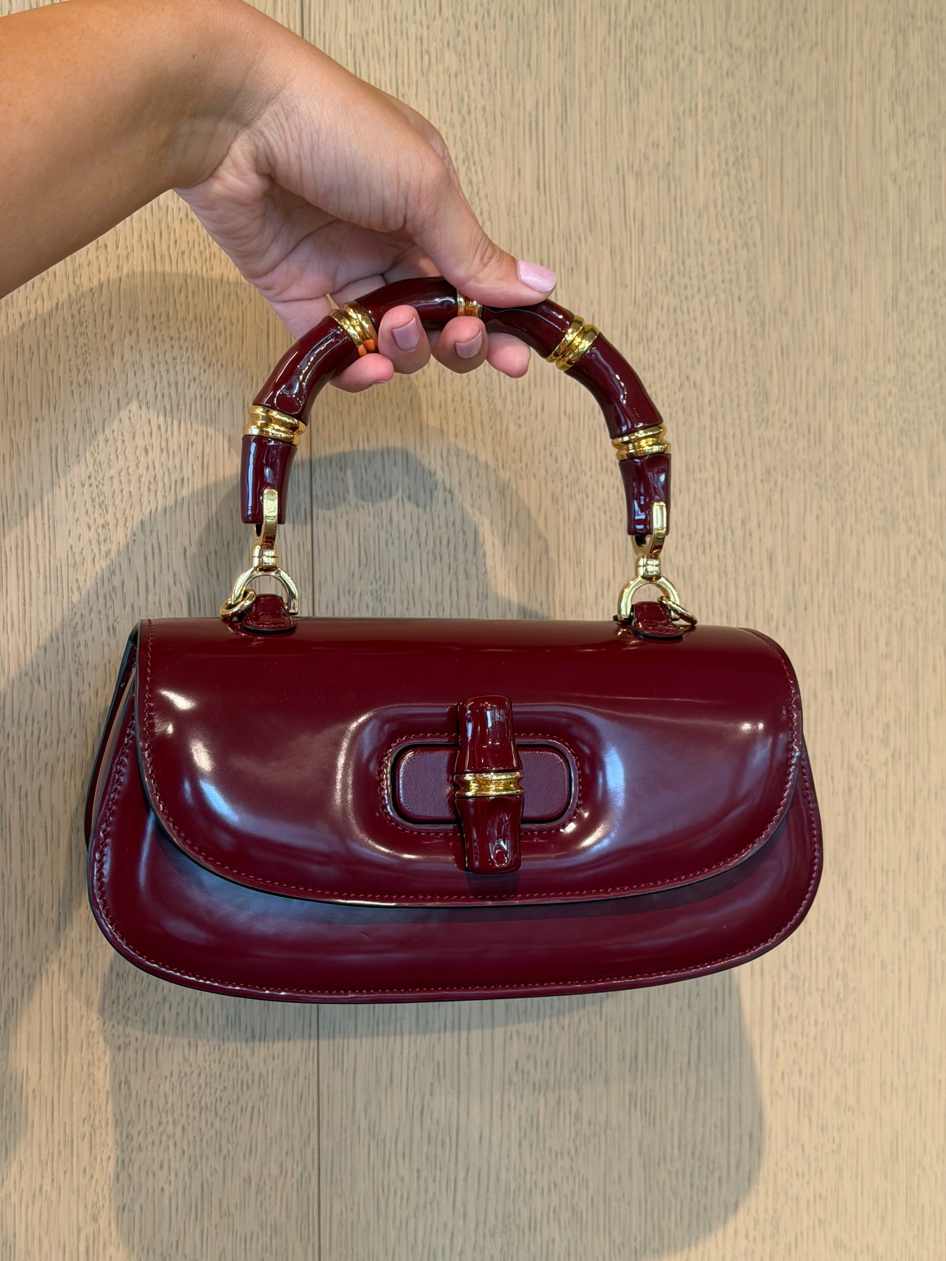 Who What Wear editor Ana Escalante holding a Gucci Medium Bamboo Diva Bag.