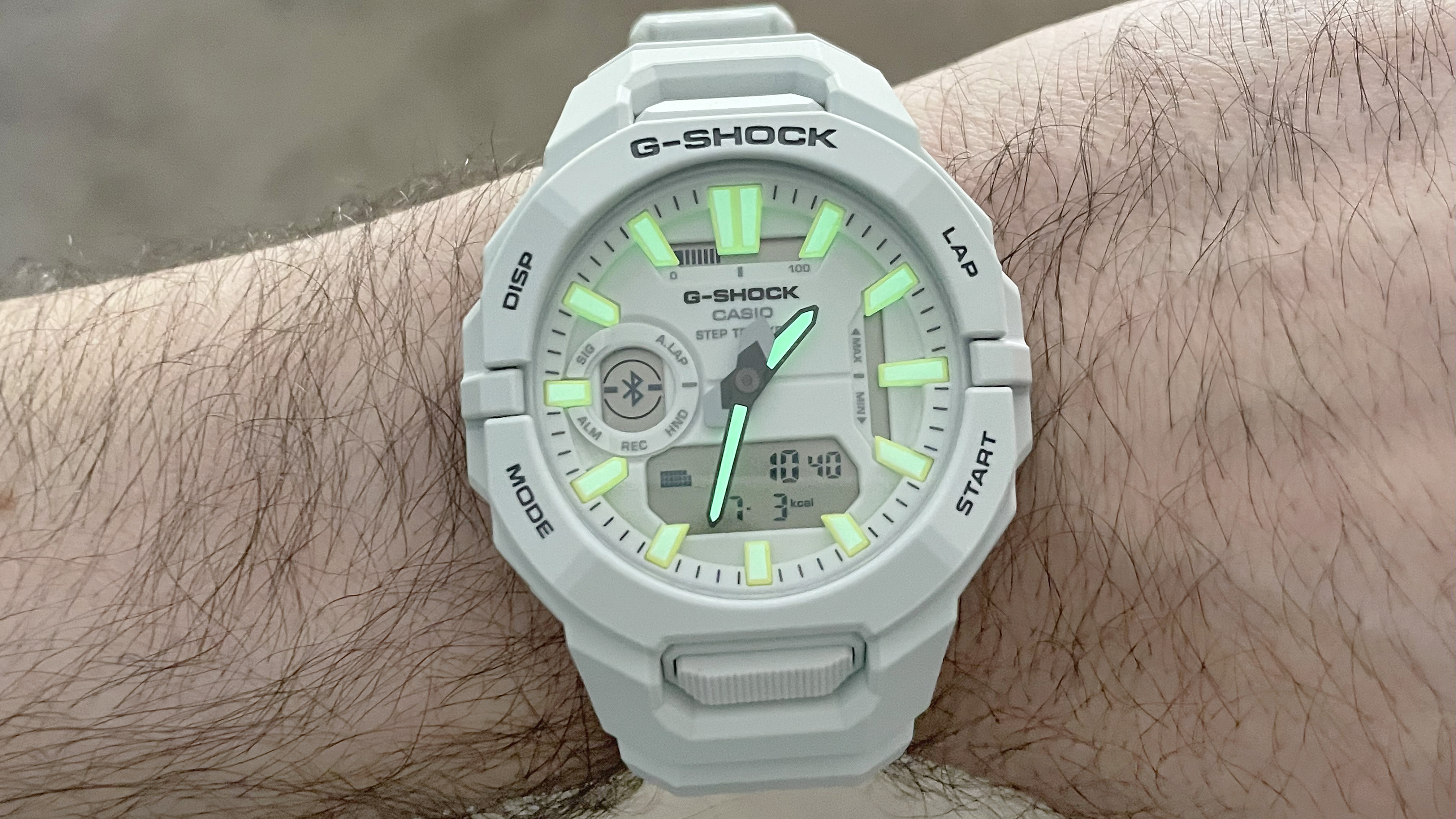 Close-up of the Casio G-Shock Move GBA950 fitness-tracking smartwatch on the writer's wrist